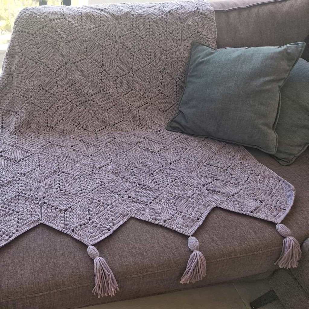 crochet blanket with tassels made by gootie