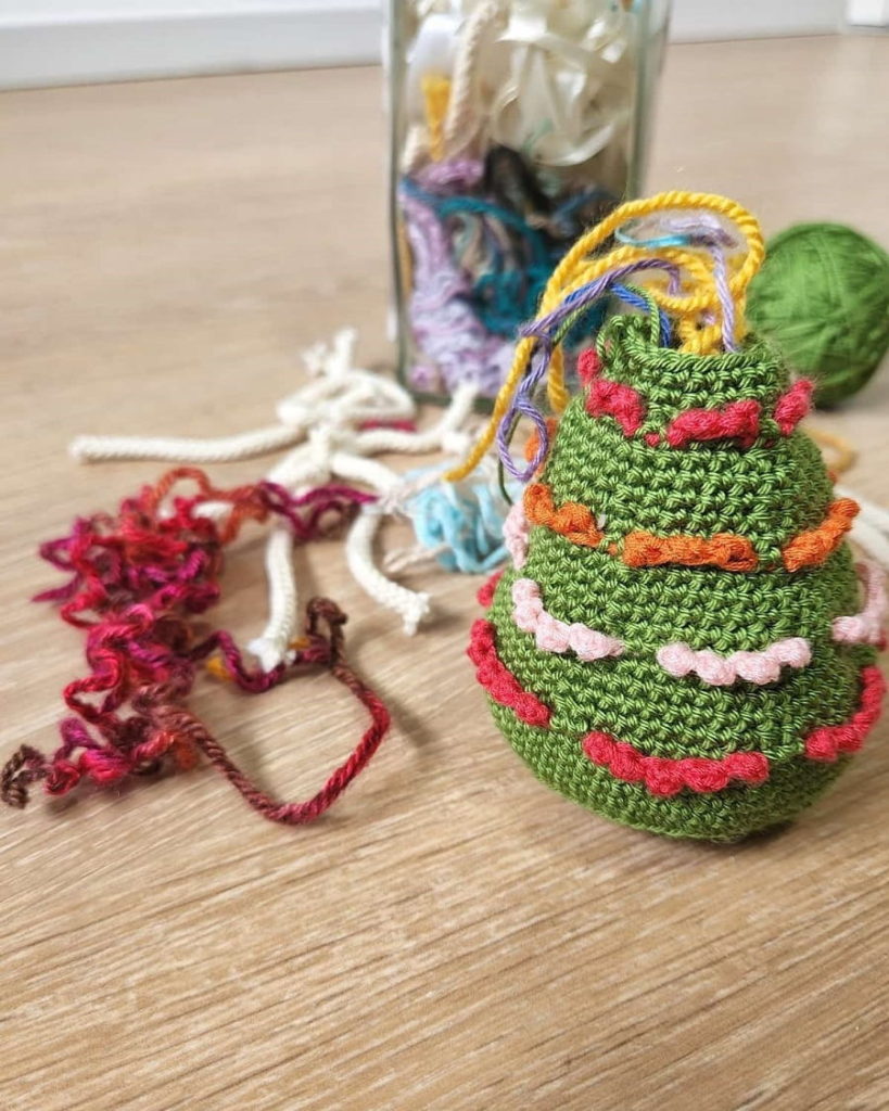 this is a photo of  simple christmas tree free crochet pattern made by gootie