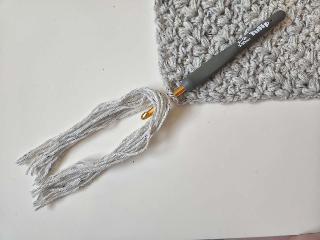 adding tassels to a crochet project